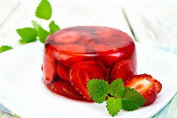 Image showing Jelly strawberry with mint on table