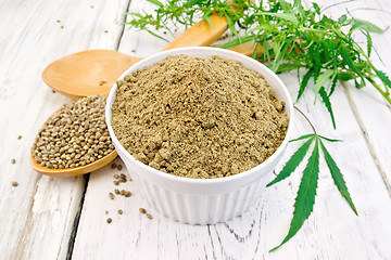 Image showing Flour hemp in bowl with spoons on light board