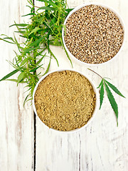 Image showing Flour hemp and grain in bowls on board top