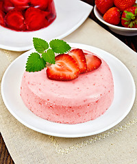 Image showing Panna cotta strawberry with mint on napkin