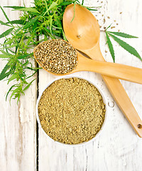 Image showing Flour hemp in bowl with spoons on light board top