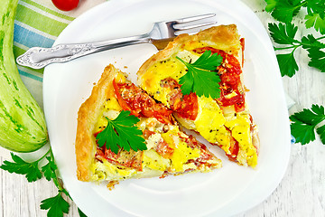 Image showing Flan with tomato and zucchini on light board top