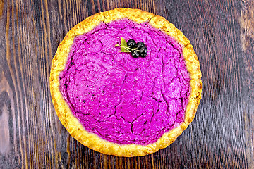 Image showing Pie of black currants on dark board top