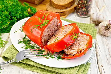 Image showing Pepper stuffed meat in plate on board