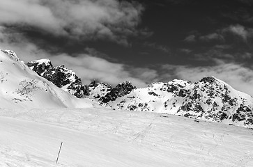 Image showing Black and white ski slope at sun winter day