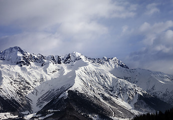 Image showing Snow winter mountain and gray sky in evening