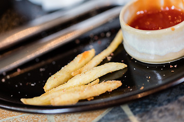 Image showing French fries, leftover from a lunch