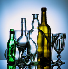 Image showing Empty Wine Glasses and Bottles