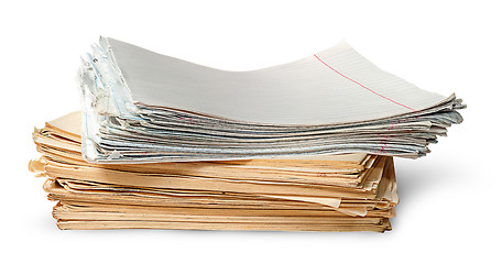 Image showing In front stack of old yellowed sheets of school notebooks