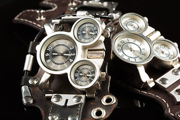 Image showing unusual watches. several alternatives dials