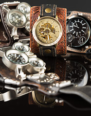 Image showing unusual watches. several alternatives dials