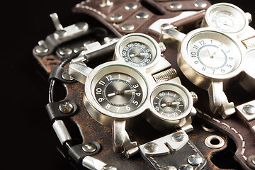 Image showing unusual watches. several alternatives dials