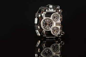 Image showing unusual watches. several alternatives dials