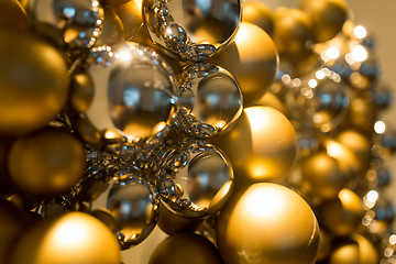 Image showing golden christmas decoration or garland of beads