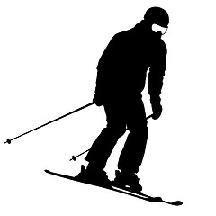 Image showing Mountain skier  speeding down slope. sport silhouette.