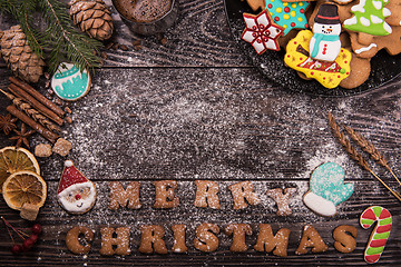 Image showing Gingerbreads and coffee for new years or christmas