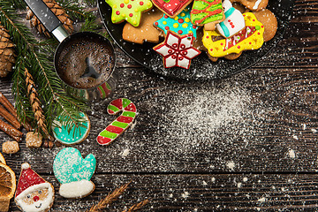 Image showing Gingerbreads and coffee for new years or christmas