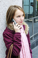 Image showing Teenage girl talking on cell phone