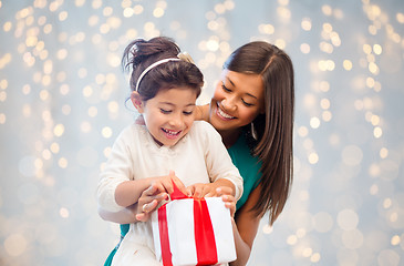 Image showing happy mother and child girl with gift box