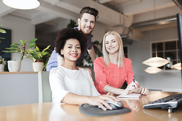 Image showing happy creative team in office