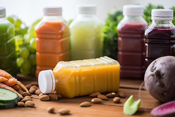 Image showing bottles with different fruit or vegetable juices