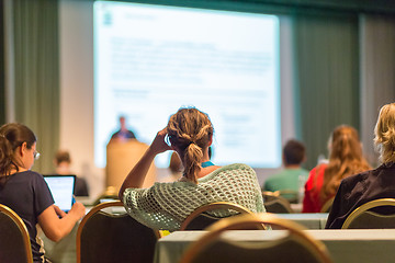 Image showing Audience in lecture hall participating at business conference.