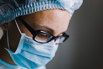 Image showing Close up view of scientist in mask