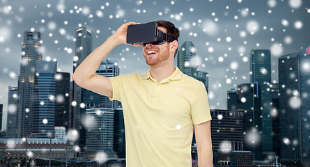 Image showing happy man in virtual reality headset or 3d glasses