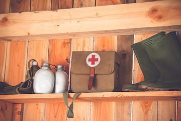 Image showing Retro medic equipment on an old wooden shelfe