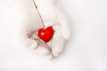 Image showing Woman hands in white gloves holding heart symbol
