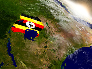 Image showing Uganda with flag in rising sun