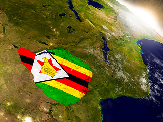 Image showing Zimbabwe with flag in rising sun