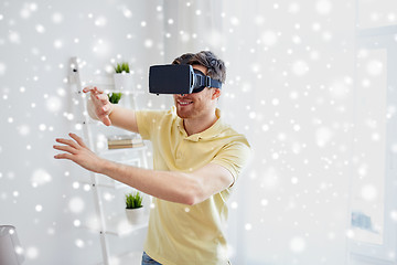 Image showing young man in virtual reality headset or 3d glasses