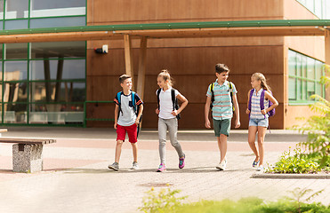 Image showing group of happy elementary school students walking