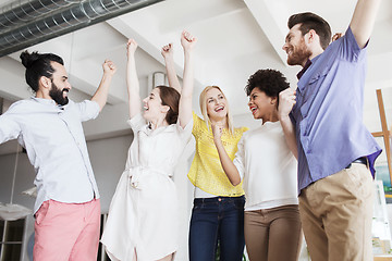 Image showing happy creative team in office