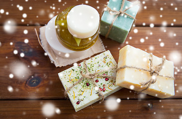 Image showing handmade soap bars on wood