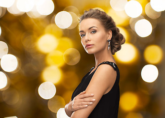 Image showing woman in evening dress and earring