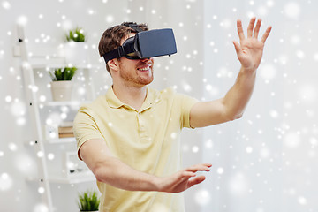 Image showing young man in virtual reality headset or 3d glasses