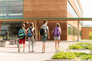 Image showing group of happy elementary school students walking