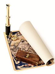 Image showing vintage telescope and compass at antique map