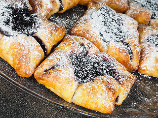 Image showing Danish pastry with blueberry jam filling with white powdered sug