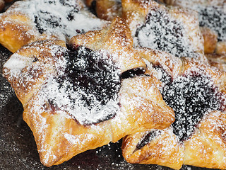 Image showing Danish pastry with blueberry jam filling with white powdered sug