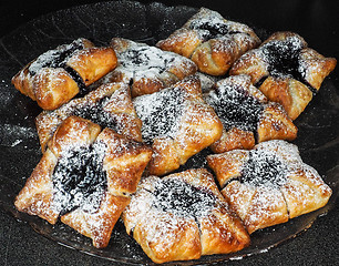 Image showing Danish pastry with blueberry jam filling with white powdered sug