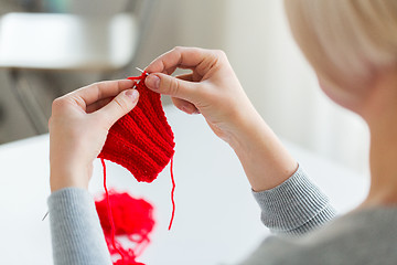 Image showing woman hands knitting with needles and yarn