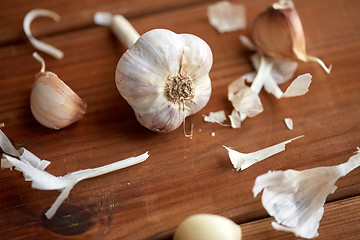 Image showing close up of garlic on wooden table