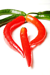 Image showing Red and green chili peppers