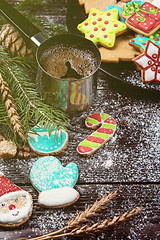 Image showing Gingerbreads and coffee for new years or christmas