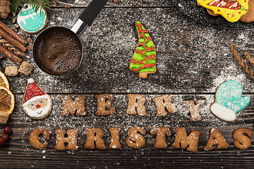 Image showing Gingerbreads and coffee for new years or christmas