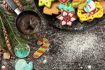 Image showing Gingerbreads and coffee for new years or christmas