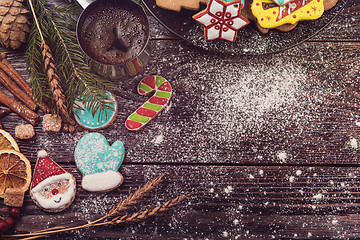 Image showing Gingerbreads and coffee for new years or christmas